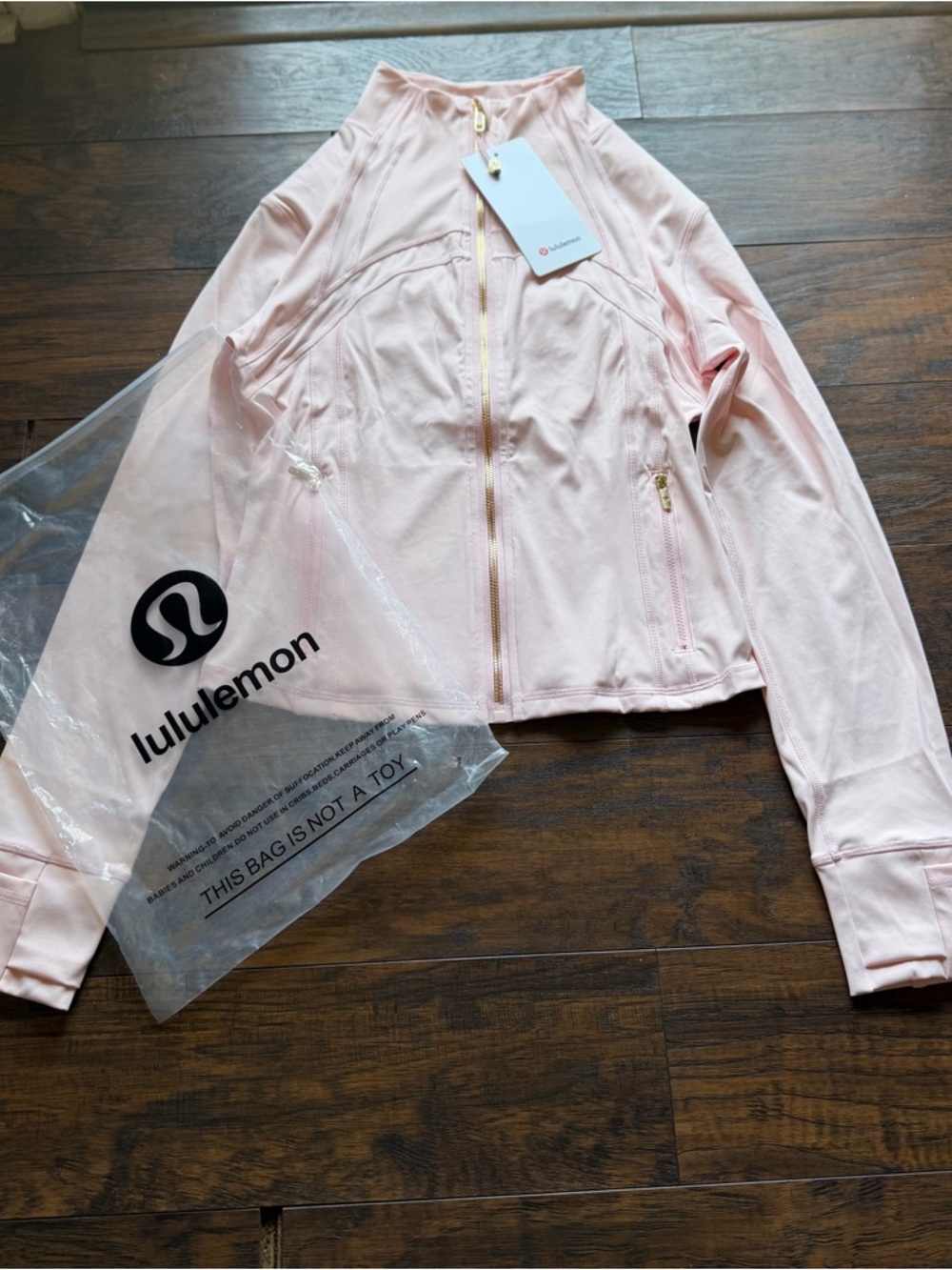lululemon athletica Light Pink Bomber Jacket with Gold Zipper